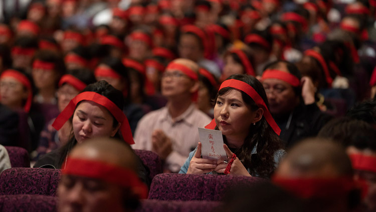 Members of the audience wearing ritual blindfolds during the Avalokiteshvara Empowerment given by His Holiness the Dalai Lama on the final day of his teachings in Yokohama, Japan on November 15, 2018. Photo by Tenzin Choejor Members of the audience wearing ritual blindfolds during the Avalokiteshvara Empowerment given by His Holiness the Dalai Lama on the final day of his teachings in Yokohama, Japan on November 15, 2018. Photo by Tenzin Choejor