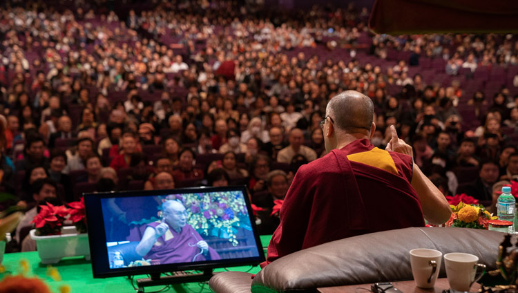 His Holiness the Dalai Lama addressing the audience at the National Convention Hall at the start of the Dialogue between Modern Science and Buddhist Science in Yokohama, Japan on November 16, 2018. Photo by Tenzin Choejor His Holiness the Dalai Lama addressing the audience at the National Convention Hall at the start of the Dialogue between Modern Science and Buddhist Science in Yokohama, Japan on November 16, 2018. Photo by Tenzin Choejor