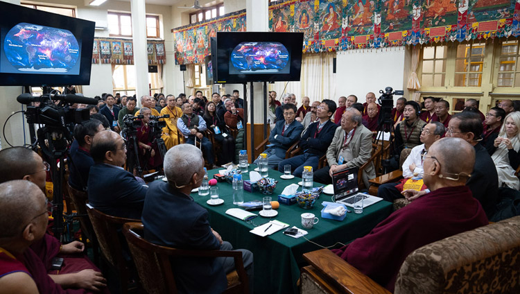 His Holiness the Dalai Lama and fellow participants watching Prof Yuan Tseh Lee's presentation on Challenges and Opportunities for a Sustainable Planet on the third day of the dialogue with Chinese scientists about quantum effects at the Main Tibetan Temple in Dharamsala, HP, India on November 3, 2018. Photo by Ven Tenzin Jamphel His Holiness the Dalai Lama and fellow participants watching Prof Yuan Tseh Lee's presentation on Challenges and Opportunities for a Sustainable Planet on the third day of the dialogue with Chinese scientists about quantum effects at the Main Tibetan Temple in Dharamsala, HP, India on November 3, 2018. Photo by Ven Tenzin Jamphel