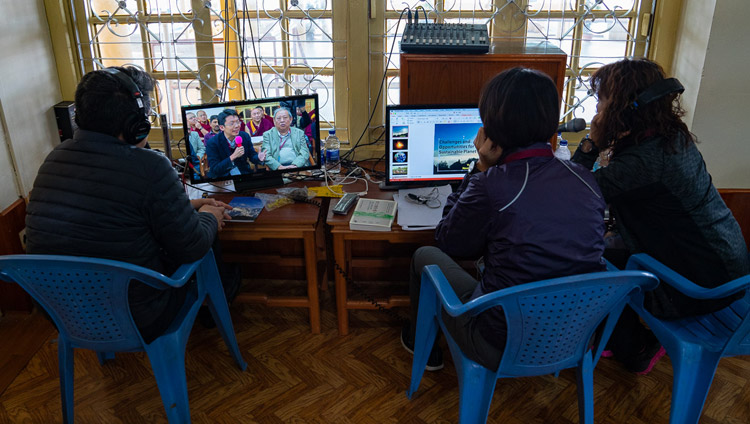 The Chinese language interpreters woking on the the third day of the Dialogue between His Holiness the Dalai Lama and Chinese Scientists on Quantum effects at the Main Tibetan Temple in Dharamsala, HP, India on November 3, 2018. Photo by Ven Tenzin Jamphel The Chinese language interpreters woking on the the third day of the Dialogue between His Holiness the Dalai Lama and Chinese Scientists on Quantum effects at the Main Tibetan Temple in Dharamsala, HP, India on November 3, 2018. Photo by Ven Tenzin Jamphel