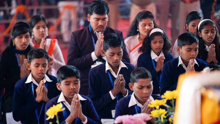 School-children reciting the Mangala Sutta in Pali opening the second day of His Holiness the Dalai Lama's teaching in Sankisa, UP, India on December 4, 2018. Photo by Lobsang Tsering School-children reciting the Mangala Sutta in Pali opening the second day of His Holiness the Dalai Lama's teaching in Sankisa, UP, India on December 4, 2018. Photo by Lobsang Tsering
