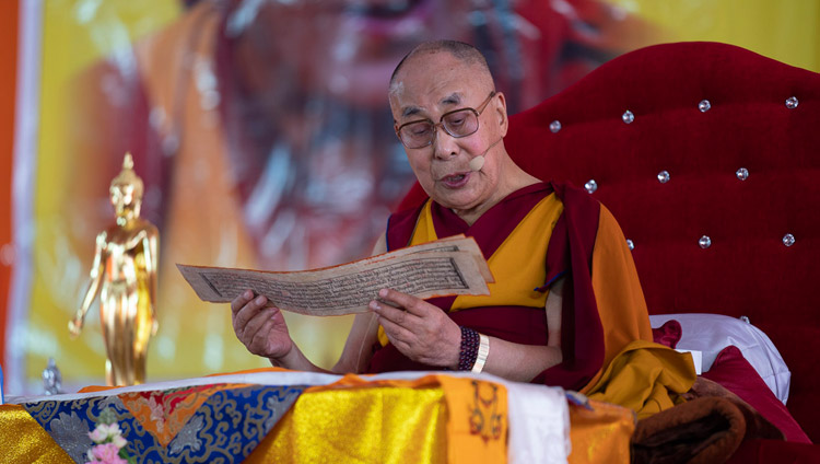 His Holiness the Dalai Lama reading from ‘Guide to the Bodhisattva’s Way of Life’ on the second day of his teaching in Sankisa, UP, India on December 4, 2018. Photo by Lobsang Tsering His Holiness the Dalai Lama reading from ‘Guide to the Bodhisattva’s Way of Life’ on the second day of his teaching in Sankisa, UP, India on December 4, 2018. Photo by Lobsang Tsering