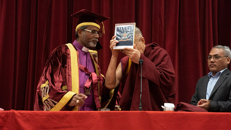 Rt. Revd. Warris K. Masih presenting His Holiness the Dalai Lama with the St Stephen's College crest at St Stephen's College Founder's Day celebration in New Delhi, India on December 7, 2018. Photo by Lobsang Tsering Rt. Revd. Warris K. Masih presenting His Holiness the Dalai Lama with the St Stephen's College crest at St Stephen's College Founder's Day celebration in New Delhi, India on December 7, 2018. Photo by Lobsang Tsering