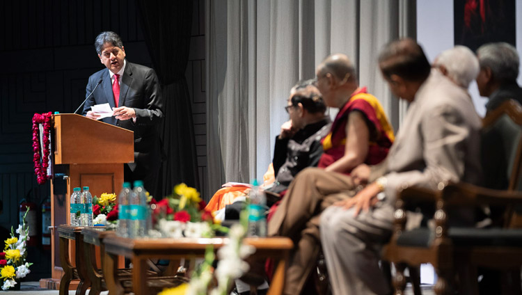 Former TV anchor Vikram Chandra reading a question from the audience for His Holiness the Dalai Lama during the 1st Yuvraj Krishan Memorial Lecture at Siri Fort Auditorium in New Delhi, India on December 8, 2018. Photo by Lobsang Tsering Former TV anchor Vikram Chandra reading a question from the audience for His Holiness the Dalai Lama during the 1st Yuvraj Krishan Memorial Lecture at Siri Fort Auditorium in New Delhi, India on December 8, 2018. Photo by Lobsang Tsering