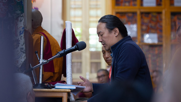 The Russian interpreter translating His Holiness the Dalai Lama's explanations during the second day of teachings requested by Russian Buddhists at the Main Tibetan Temple in Dharamsala, HP, India on May 11, 2019. Photo by Lobsang Tsering The Russian interpreter translating His Holiness the Dalai Lama's explanations during the second day of teachings requested by Russian Buddhists at the Main Tibetan Temple in Dharamsala, HP, India on May 11, 2019. Photo by Lobsang Tsering