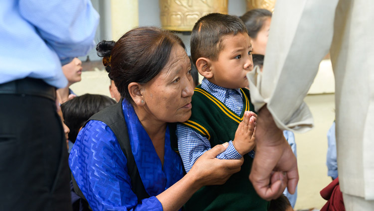 Young and old members of the Tibetan community watching as His Holiness the Dalai Lama arrives at the Main Tibetan Temple for his teaching for young Tibetans in Dharamsala, HP, India on June 3, 2019. Photo by Tenzin Choejor Young and old members of the Tibetan community watching as His Holiness the Dalai Lama arrives at the Main Tibetan Temple for his teaching for young Tibetans in Dharamsala, HP, India on June 3, 2019. Photo by Tenzin Choejor