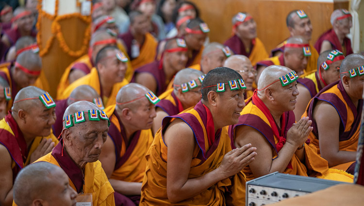 Monks from Dzongkhar Chödé Monastery listening as His Holiness the Dalai Lama gives the Avalokiteshvara Empowerment at the Main Tibetan Temple in Dharamsala, HP, India on June 5, 2019. Photo by Tenzin Choejor Monks from Dzongkhar Chödé Monastery listening as His Holiness the Dalai Lama gives the Avalokiteshvara Empowerment at the Main Tibetan Temple in Dharamsala, HP, India on June 5, 2019. Photo by Tenzin Choejor