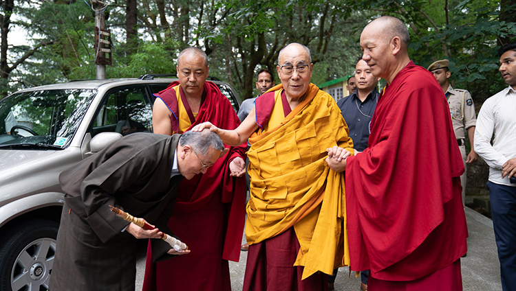 His Holiness the Dalai Lama affectionately greeting former Kalön Tripa, Tenzin Namgyal Tethong, as he makes his way from his residence to the Main Tibetan Temple in Dharamsala, HP, India on July 5, 2019. Photo by Tenzin Choejor His Holiness the Dalai Lama affectionately greeting former Kalön Tripa, Tenzin Namgyal Tethong, as he makes his way from his residence to the Main Tibetan Temple in Dharamsala, HP, India on July 5, 2019. Photo by Tenzin Choejor