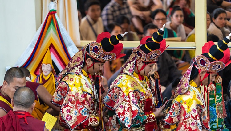 Namgyal Monks dressed in traditional costume taking part in the Long Life Offering Cereony for His Holiness the Dalai Lama at the Main Tibetan Temple in Dharamsala, HP, India on July 5, 2019. Photo by Tenzin Choejor Namgyal Monks dressed in traditional costume taking part in the Long Life Offering Cereony for His Holiness the Dalai Lama at the Main Tibetan Temple in Dharamsala, HP, India on July 5, 2019. Photo by Tenzin Choejor