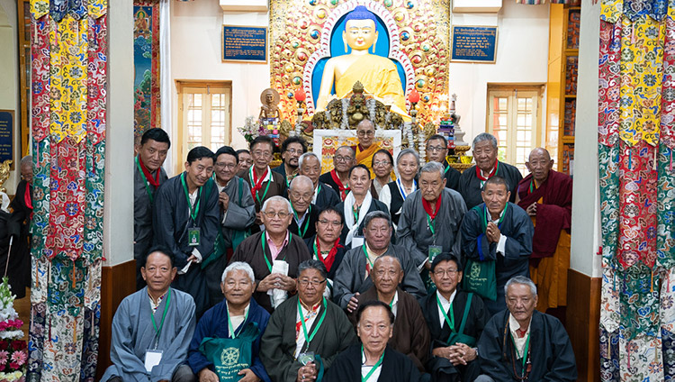 His Holiness the Dalai Lama poses for a photo with former CTA officials at the conclusion of the Long Life Offering ceremony at the Main Tibetan Temple in Dharamsala, HP, India on July 5, 2019. Photo by Tenzin Choejor His Holiness the Dalai Lama poses for a photo with former CTA officials at the conclusion of the Long Life Offering ceremony at the Main Tibetan Temple in Dharamsala, HP, India on July 5, 2019. Photo by Tenzin Choejor