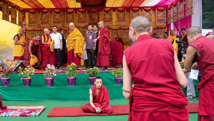 Monks debating in front of the stage as His Holiness the Dalai Lama arrives at the teaching venue in Manali, HP, India on August 13, 2019. Photo by Tenzin Choejor Monks debating in front of the stage as His Holiness the Dalai Lama arrives at the teaching venue in Manali, HP, India on August 13, 2019. Photo by Tenzin Choejor