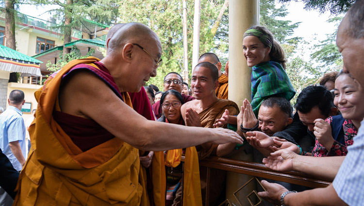 His Holiness the Dalai Lama greeting members of the crowd as he walks to the Main Tibetan Temple for the first day of teachings in Dharamsala, HP, India on September 4, 2019. Photo by Tenzin Choejor His Holiness the Dalai Lama greeting members of the crowd as he walks to the Main Tibetan Temple for the first day of teachings in Dharamsala, HP, India on September 4, 2019. Photo by Tenzin Choejor