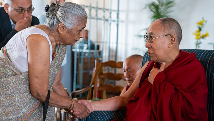 His Holiness the Dalai Lama greeting a member of the audience before his talk to intellectuals, academics and diplomats in New Delhi, India on September 21, 2019. Photo by Tenzin Choejor His Holiness the Dalai Lama greeting a member of the audience before his talk to intellectuals, academics and diplomats in New Delhi, India on September 21, 2019. Photo by Tenzin Choejor