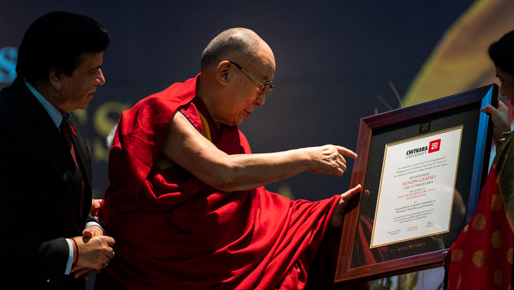 His Holiness the Dalai Lama holding the degree of Honorary Doctor of Literature presented by Chitkara University in Chandigarh, India on October 14, 2019. Photo by Tenzin Choejor His Holiness the Dalai Lama holding the degree of Honorary Doctor of Literature presented by Chitkara University in Chandigarh, India on October 14, 2019. Photo by Tenzin Choejor
