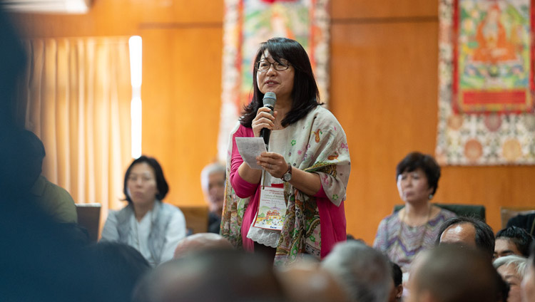 A member of the audience asking His Holiness the Dalai Lama a question during his meeting with members of the International Network of Engaged Buddhists at his residence in Dharamsala, HP, India on October 21, 2019. Photo by Tenzin Choejor A member of the audience asking His Holiness the Dalai Lama a question during his meeting with members of the International Network of Engaged Buddhists at his residence in Dharamsala, HP, India on October 21, 2019. Photo by Tenzin Choejor