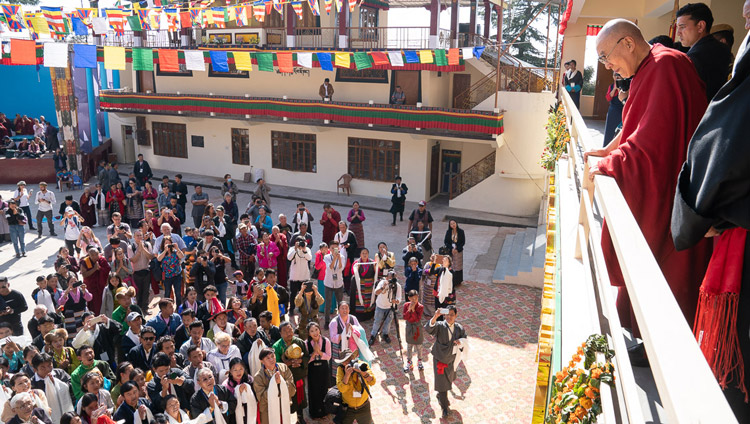 His Holiness the Dalai Lama watching from the balcony as former TIPA artists and members of the public perform songs in the courtyard of the Tibetan Institute of Performing Arts in Dharamsala, India on October 29, 2019. Photo by Tenzin Choejor His Holiness the Dalai Lama watching from the balcony as former TIPA artists and members of the public perform songs in the courtyard of the Tibetan Institute of Performing Arts in Dharamsala, India on October 29, 2019. Photo by Tenzin Choejor