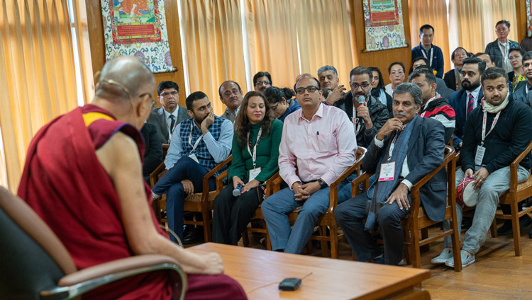 A member of the audience asking His Holiness the Dalai Lama a question during his meeting with delegates to the Rising Himachal Global Investors' Meet at his residence in Dharamsala, HP, India on November 8, 2019. Photo by Tenzin Choejor A member of the audience asking His Holiness the Dalai Lama a question during his meeting with delegates to the Rising Himachal Global Investors' Meet at his residence in Dharamsala, HP, India on November 8, 2019. Photo by Tenzin Choejor