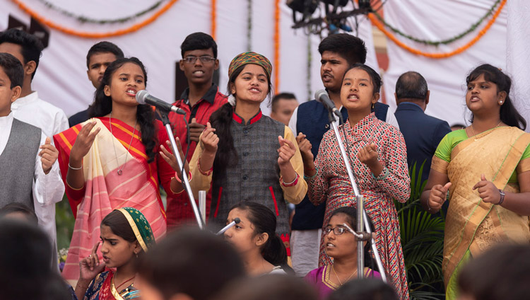 Students from Pratyek, an NGO educating and looking after underprivileged children, presenting a rap about children’s rights at the start of His Holiness the Dalai Lama's talk at St. Columba's School in New Delhi, India on November 20, 2019. Photo by Tenzin Choejor