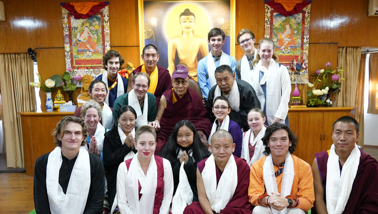His Holiness the Dalai Lama wearing a cap presented by students from Earlham College during a group photo after their meeting at his residence in Dharamsala, HP, India on December 2, 2019. Photo by Ven Tenzin Jamphel His Holiness the Dalai Lama wearing a cap presented by students from Earlham College during a group photo after their meeting at his residence in Dharamsala, HP, India on December 2, 2019. Photo by Ven Tenzin Jamphel
