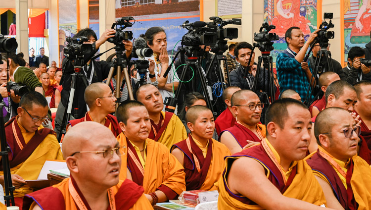 A view of members of the press filming His Holiness the Dalai Lama speaking at the inauguration of he Symposium on Monastic Education to mark the 25th anniversary of Kirti Jepa Dratsang in Dharamsala, HP, India on December 7, 2019. Photo by Manuel Bauer A view of members of the press filming His Holiness the Dalai Lama speaking at the inauguration of he Symposium on Monastic Education to mark the 25th anniversary of Kirti Jepa Dratsang in Dharamsala, HP, India on December 7, 2019. Photo by Manuel Bauer