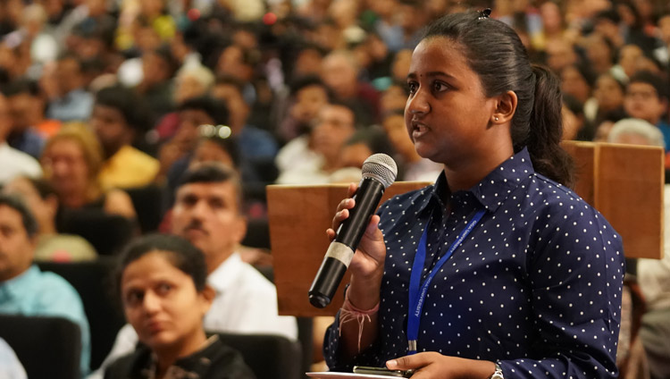 A student from Goa University asking His Holiness the Dalai Lama a question during his talk at Kala Academy in Goa, India on December 11, 2019. Photo by Lobsang Tsering A student from Goa University asking His Holiness the Dalai Lama a question during his talk at Kala Academy in Goa, India on December 11, 2019. Photo by Lobsang Tsering