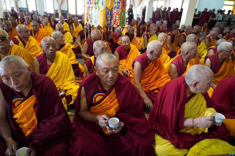 Members of the congregation having tea during ceremonies to welcome His Holiness the Dalai Lama to Drepung Lachi in Mundgod, Karnataka, India on December 12, 2019. Photo by Lobsang Tsering Members of the congregation having tea during ceremonies to welcome His Holiness the Dalai Lama to Drepung Lachi in Mundgod, Karnataka, India on December 12, 2019. Photo by Lobsang Tsering