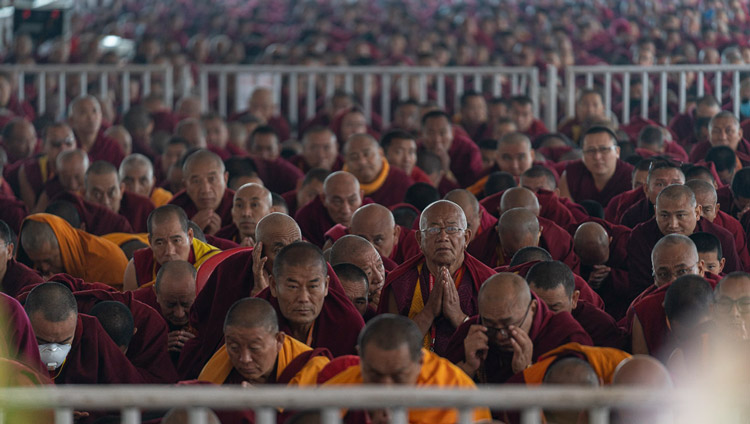 Monastics in the crowd taking the bodhisattva vows from His Holiness the Dalai Lama at the Kalachakra Ground in Bodhgaya, Bihar, India on January 3, 2020. Photo by Tenzin Choejor Monastics in the crowd taking the bodhisattva vows from His Holiness the Dalai Lama at the Kalachakra Ground in Bodhgaya, Bihar, India on January 3, 2020. Photo by Tenzin Choejor