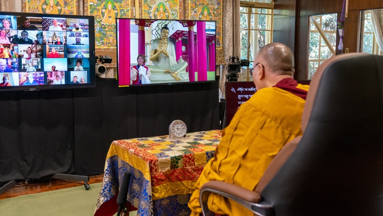 A member of the virtual audience standing by the Nagarjuna staute outside the Golden Abode of Buddha Shakyamuni, the Central Buddhist Monastery in the Republic of Kalmykia, asking His Holiness the Dalai Lama a question on the third day of his teachings from his residence in Dharamsala, HP, India on November 7, 2020. Photo by Ven Tenzin Jamphel A member of the virtual audience standing by the Nagarjuna staute outside the Golden Abode of Buddha Shakyamuni, the Central Buddhist Monastery in the Republic of Kalmykia, asking His Holiness the Dalai Lama a question on the third day of his teachings from his residence in Dharamsala, HP, India on November 7, 2020. Photo by Ven Tenzin Jamphel