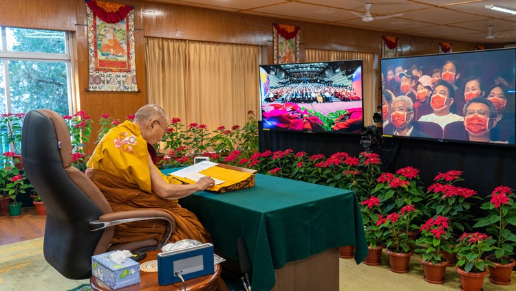His Holiness the Dalai Lama reading from ‘Illuminating the Threefold Faith: An Invocation of the Seventeen Great Scholar-Adepts of Glorious Nalanda’ during an online program celebrating his having been awarded the Nobel Peace Prize in 1989 from his residence in Dharamsala, HP, India on December 11, 2021. Photo by Ven Tenzin Jamphel His Holiness the Dalai Lama reading from ‘Illuminating the Threefold Faith: An Invocation of the Seventeen Great Scholar-Adepts of Glorious Nalanda’ during an online program celebrating his having been awarded the Nobel Peace Prize in 1989 from his residence in Dharamsala, HP, India on December 11, 2021. Photo by Ven Tenzin Jamphel