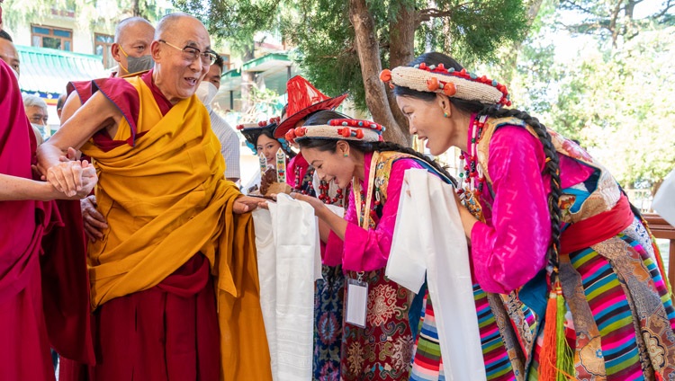 Performers from the Tibetan Institute of Performing Arts welcoming His Holiness the Dalai Lama as he arrives at the courtyard of the Main Tibetan Temple in Dharamsala, HP, India on April 7, 2022. Photo by Tenzin Choejor Performers from the Tibetan Institute of Performing Arts welcoming His Holiness the Dalai Lama as he arrives at the courtyard of the Main Tibetan Temple in Dharamsala, HP, India on April 7, 2022. Photo by Tenzin Choejor