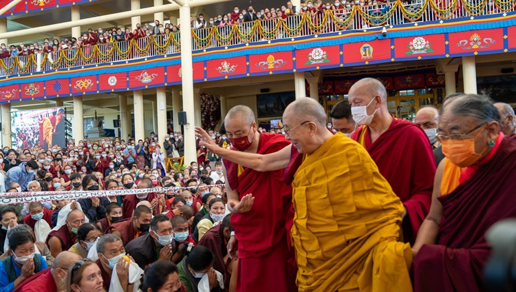 His Holiness the Dalai Lama waving to the crowd gathered in the courtyard of the Main Tibetan Temple as he heads back to his residence at the conclusion of the Long Life Offering in Dharamsala, HP, India on May 25, 2022. Photo by Tenzin Choejor His Holiness the Dalai Lama waving to the crowd gathered in the courtyard of the Main Tibetan Temple as he heads back to his residence at the conclusion of the Long Life Offering in Dharamsala, HP, India on May 25, 2022. Photo by Tenzin Choejor