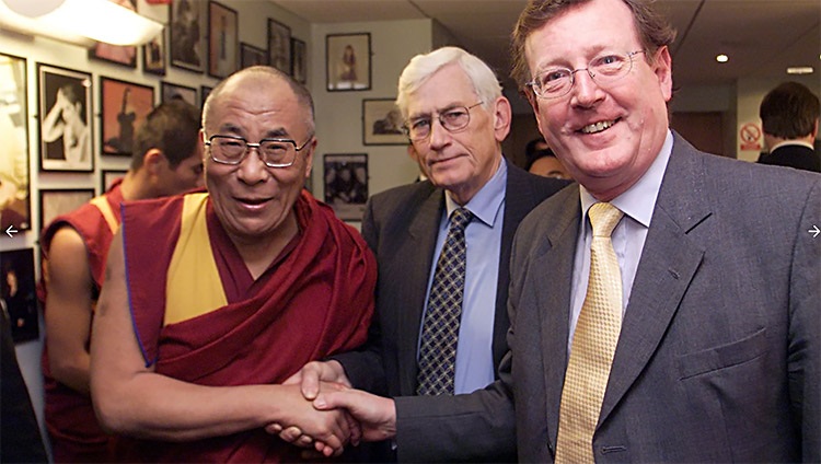 His Holiness the Dalai Lama greets then Northern Ireland First Minister David Trimble and Deputy First Minister Seamus Mallon at Belfast in 2000. His Holiness the Dalai Lama greets then Northern Ireland First Minister David Trimble and Deputy First Minister Seamus Mallon at Belfast in 2000.