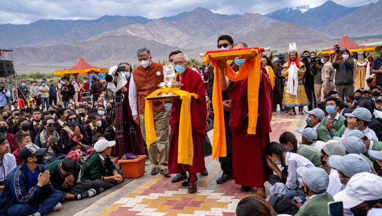 Thiksay Rinpoche carrying the Ladakh dPal rNgam Dusdon Award 2022 to present to His Holiness the Dalai Lama at Sindhu Ghat in Leh, Ladakh, UT, India on August 5, 2022. Photo by Tenzin Choejor Thiksay Rinpoche carrying the Ladakh dPal rNgam Dusdon Award 2022 to present to His Holiness the Dalai Lama at Sindhu Ghat in Leh, Ladakh, UT, India on August 5, 2022. Photo by Tenzin Choejor