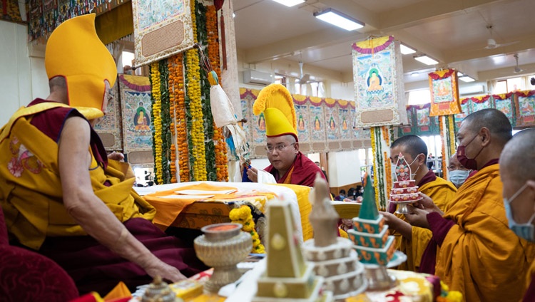 Ling Rinpoché presenting traditional offerings to His Holiness the Dalai Lama during the Long Life Prayer at the Main Tibetan Temple in Dharamsala, HP, India on October 26, 2022. Photo by Tenzin Choejor Ling Rinpoché presenting traditional offerings to His Holiness the Dalai Lama during the Long Life Prayer at the Main Tibetan Temple in Dharamsala, HP, India on October 26, 2022. Photo by Tenzin Choejor