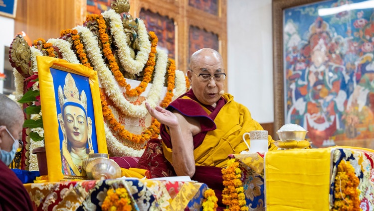 His Holiness the Dalai Lama gesturing towards a photograph of the Chenrezig Wati Sangpo statue that he keeps in his residence during the Long Life Offering ceremony at the Main Tibetan Temple in Dharamsala, HP, India on November 30, 2022. Photo by Tenzin Choejor His Holiness the Dalai Lama gesturing towards a photograph of the Chenrezig Wati Sangpo statue that he keeps in his residence during the Long Life Offering ceremony at the Main Tibetan Temple in Dharamsala, HP, India on November 30, 2022. Photo by Tenzin Choejor