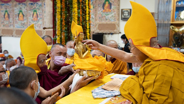 Ganden Tri Rinpoché presenting offerings to His Holiness the Dalai Lama during the Long Life Offering ceremony at the Main Tibetan Temple in Dharamsala, HP, India on November 30, 2022. Photo by Tenzin Choejor Ganden Tri Rinpoché presenting offerings to His Holiness the Dalai Lama during the Long Life Offering ceremony at the Main Tibetan Temple in Dharamsala, HP, India on November 30, 2022. Photo by Tenzin Choejor