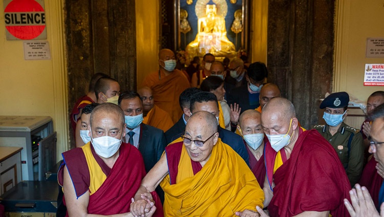 His Holiness the Dalai Lama leaving the chapel after joining in prayers at the Mahabodhi Temple in Bodhgaya, Bihar, India on December 23, 2022. Photo by Tenzin Choejor His Holiness the Dalai Lama leaving the chapel after joining in prayers at the Mahabodhi Temple in Bodhgaya, Bihar, India on December 23, 2022. Photo by Tenzin Choejor