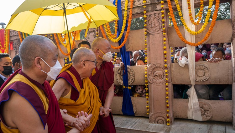 His Holiness the Dalai Lama greeting the devout gathered at the Mahabodhi Temple in Bodhgaya, Bihar, India on December 23, 2022. Photo by Tenzin Choejor His Holiness the Dalai Lama greeting the devout gathered at the Mahabodhi Temple in Bodhgaya, Bihar, India on December 23, 2022. Photo by Tenzin Choejor