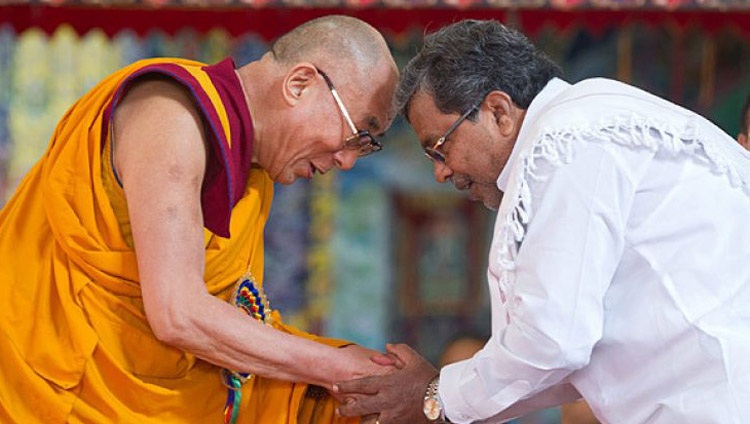 His Holiness the Dalai Lama with Karnataka Chief Minister Siddaramaiah during His Holiness's 78th birthday celebrations at Sera Je Monastery in Bylakuppe, Karnataka, India on July 6, 2013. Photo by Tenzin Choejor His Holiness the Dalai Lama with Karnataka Chief Minister Siddaramaiah during His Holiness's 78th birthday celebrations at Sera Je Monastery in Bylakuppe, Karnataka, India on July 6, 2013. Photo by Tenzin Choejor