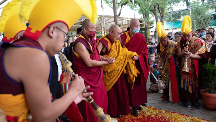 His Holiness the Dalai Lama walking through the Main Tibetan courtyard on his way to attend a Long Life Prayers offered to him by the Foundation for the Preservation of the Mahayana Tradition (FPMT) in Dharamsala, HP, India on May 24, 2023. Photo by Tenzin Choejor His Holiness the Dalai Lama walking through the Main Tibetan courtyard on his way to attend a Long Life Prayers offered to him by the Foundation for the Preservation of the Mahayana Tradition (FPMT) in Dharamsala, HP, India on May 24, 2023. Photo by Tenzin Choejor
