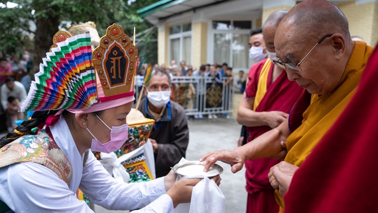 Tibetans in traditional costume offering His Holiness the Dalai Lama ‘Chema Changpu’, a traditional welcome as he arrives at the Main Tibetan Temple courtyard on the first day of teachings for Tibetan youth in Dharamsala, HP, India on May 30, 2023. Photo by Tenzin Choejor Tibetans in traditional costume offering His Holiness the Dalai Lama ‘Chema Changpu’, a traditional welcome as he arrives at the Main Tibetan Temple courtyard on the first day of teachings for Tibetan youth in Dharamsala, HP, India on May 30, 2023. Photo by Tenzin Choejor