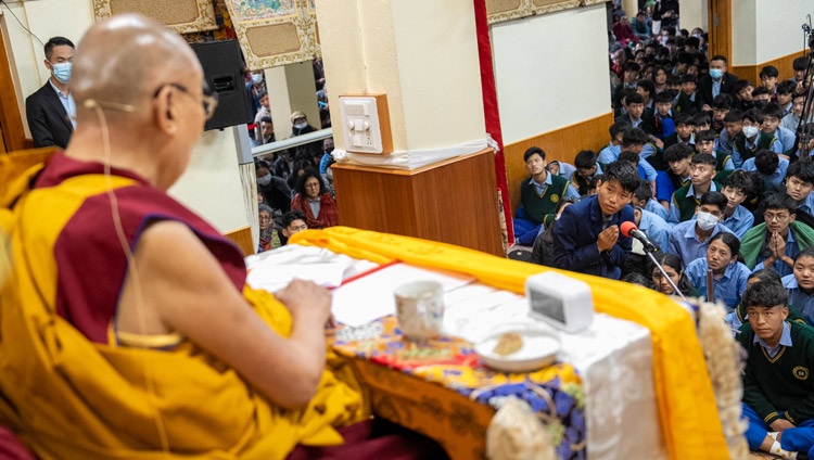A student asking His Holiness the Dalai Lama a question on the first day of teachings for Tibetan Youth at the Main Tibetan Temple in Dharamsala, HP, India on May 30, 2023. Photo by Tenzin Choejor A student asking His Holiness the Dalai Lama a question on the first day of teachings for Tibetan Youth at the Main Tibetan Temple in Dharamsala, HP, India on May 30, 2023. Photo by Tenzin Choejor