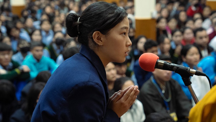 A Tibetan student asking His Holiness the Dalai Lama a question on the second day of teachings for Tibetan youth at the Main Tibetan Temple in Dharamsala, HP, India on May 31, 2023. Photo by Tenzin Choejor