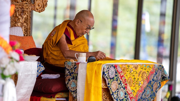 His Holiness the Dalai Lama commenting on the text "Thirty-seven Practices of All Bodhisattvas" on the first day of teachings at the Shewatsel Teaching Area in Leh, Ladakh UT, India on July 21, 2023. Photo by Tenzin Choejor His Holiness the Dalai Lama commenting on the text "Thirty-seven Practices of All Bodhisattvas" on the first day of teachings at the Shewatsel Teaching Area in Leh, Ladakh UT, India on July 21, 2023. Photo by Tenzin Choejor