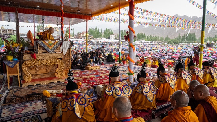 His Holiness the Dalai Lama conferring the Avalokiteshvara Empowerment to a crowd of about 65,000 at the Shewatsel Teaching Ground in Leh, Ladakh, India on July 23, 2023. Photo by Tenzin Choejor His Holiness the Dalai Lama conferring the Avalokiteshvara Empowerment to a crowd of about 65,000 at the Shewatsel Teaching Ground in Leh, Ladakh, India on July 23, 2023. Photo by Tenzin Choejor