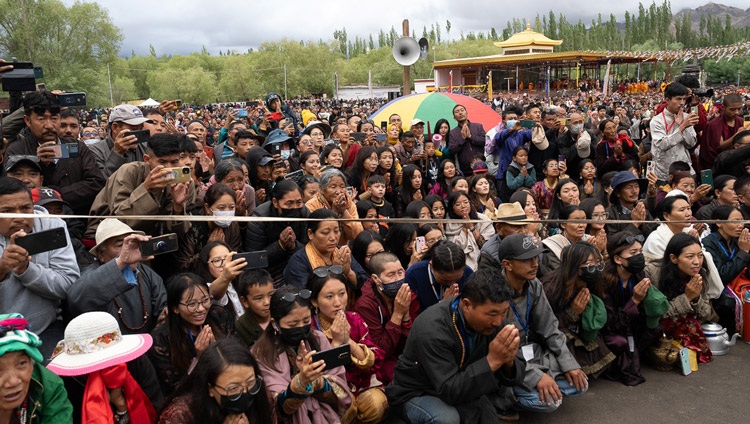 Some of the crowd of about 65,000 waiting for His Holiness the Dalai Lama to arrive at the Shewatsel Teaching Ground on the second day of teachings in Leh, Ladakh, India on July 23, 2023. Photo by Tenzin Choejor Some of the crowd of about 65,000 waiting for His Holiness the Dalai Lama to arrive at the Shewatsel Teaching Ground on the second day of teachings in Leh, Ladakh, India on July 23, 2023. Photo by Tenzin Choejor