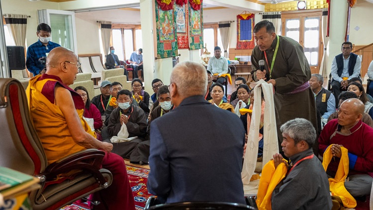 A member of the audience asking His Holiness the Dalai Lama a question during his meeting with core members of the SEE Learning team in Ladakh at his residence at Shewatsel, Leh, Ladakh, India on August 10, 2023. Photo by Tenzin Choejor A member of the audience asking His Holiness the Dalai Lama a question during his meeting with core members of the SEE Learning team in Ladakh at his residence at Shewatsel, Leh, Ladakh, India on August 10, 2023. Photo by Tenzin Choejor