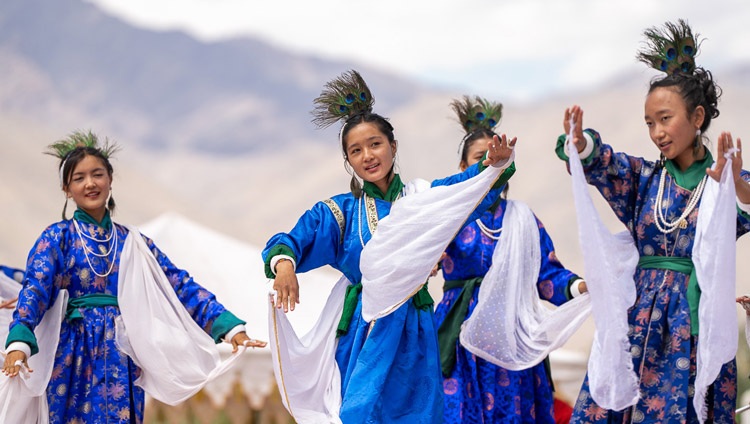 School children performing a traditional dance at the farewell lunch for His Holiness the Dalai Lama at Sindhu Ghat in Leh, Ladakh, India on August 16, 2023. Photo by Tenzin Choejor School children performing a traditional dance at the farewell lunch for His Holiness the Dalai Lama at Sindhu Ghat in Leh, Ladakh, India on August 16, 2023. Photo by Tenzin Choejor