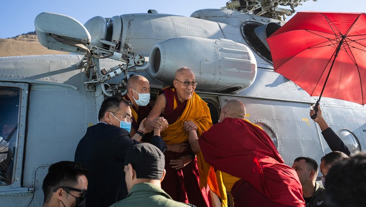 His Holiness the Dalai Lama arriving at the helipad near the teaching ground in Khaltse, Ladakh, India on August 18, 2023. Photo by Tenzin Choejor His Holiness the Dalai Lama arriving at the helipad near the teaching ground in Khaltse, Ladakh, India on August 18, 2023. Photo by Tenzin Choejor