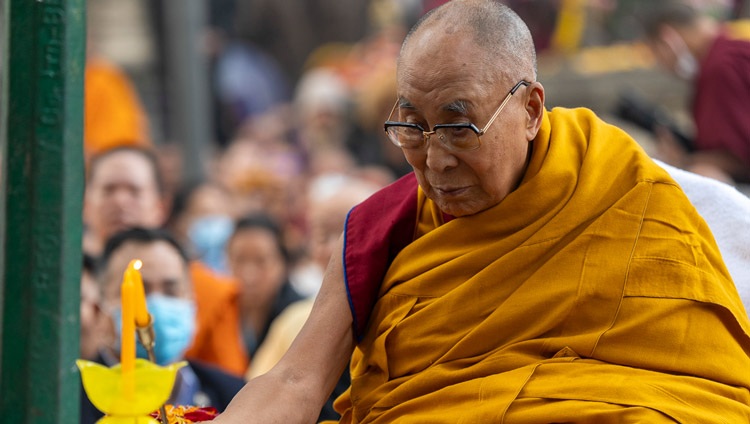 His Holiness the Dalai Lama lighting a lamp to open the gathering at the Mahabodhi Temple in Bodhgaya, Bihar, India on December 23, 2023. Photo by Tenzin Choejor His Holiness the Dalai Lama lighting a lamp to open the gathering at the Mahabodhi Temple in Bodhgaya, Bihar, India on December 23, 2023. Photo by Tenzin Choejor